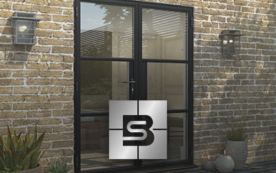 Black steel door installation for a residential home